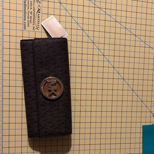 Michael Kors Brown Wallet with Gold Logo